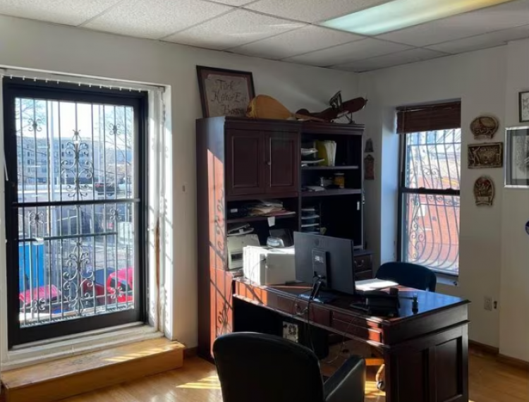 Conference Room/Open Area with views of Boston St. and Highway